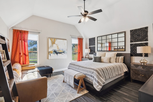 bedroom featuring hardwood / wood-style floors, ceiling fan, and vaulted ceiling