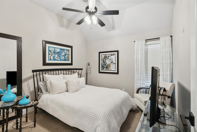 bedroom with carpet, ceiling fan, and lofted ceiling