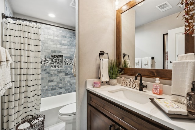 full bathroom featuring vanity, shower / bath combination with curtain, and toilet