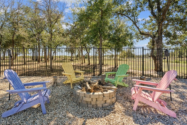 view of patio featuring an outdoor fire pit