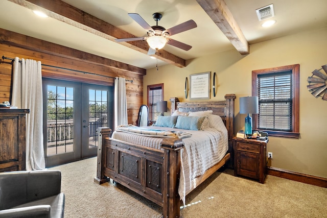 bedroom featuring french doors, light colored carpet, ceiling fan, and access to outside