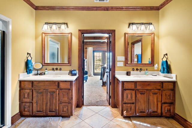 bathroom with tile patterned flooring, vanity, and ornamental molding