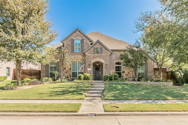 view of front facade with a front yard