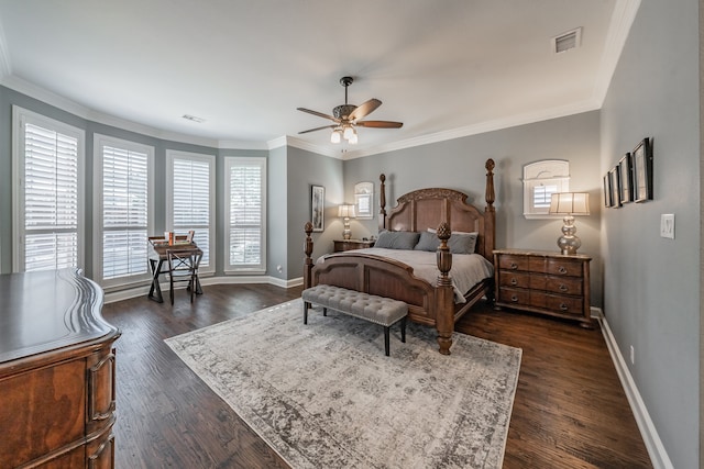 bedroom featuring ornamental molding, dark hardwood / wood-style floors, and ceiling fan