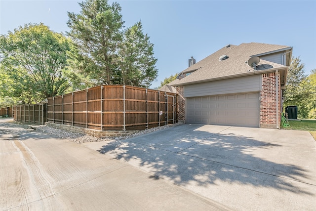 view of home's exterior with cooling unit