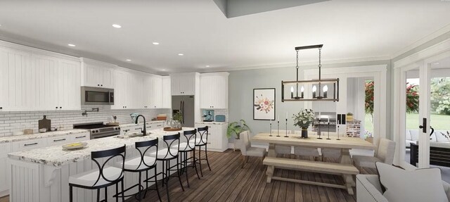 kitchen featuring pendant lighting, dark hardwood / wood-style floors, white cabinetry, stainless steel appliances, and a chandelier