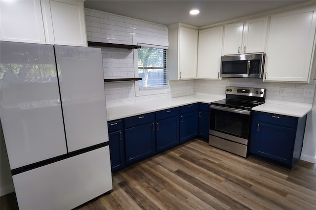 kitchen featuring white cabinetry, blue cabinets, dark wood-type flooring, and appliances with stainless steel finishes