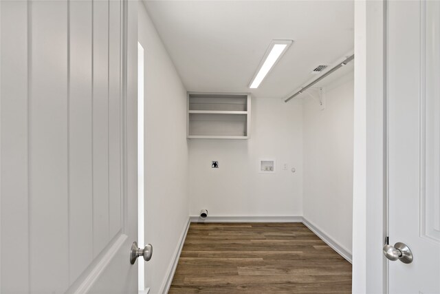 clothes washing area featuring hookup for an electric dryer, washer hookup, gas dryer hookup, and dark wood-type flooring