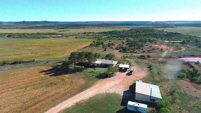 birds eye view of property featuring a rural view