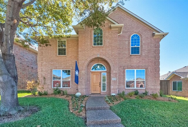 view of front property with a front lawn