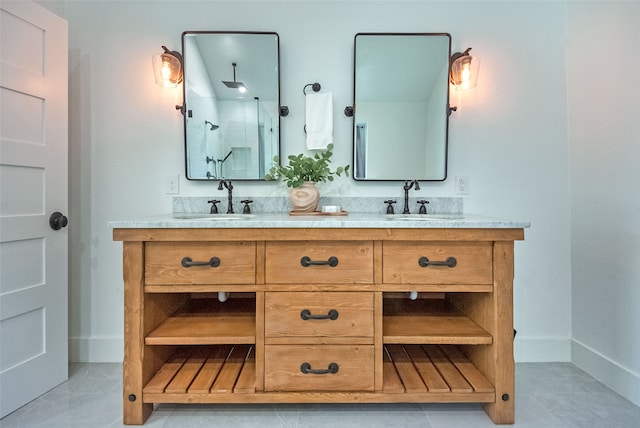 bathroom with tile patterned flooring and vanity