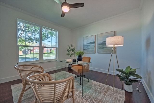 home office featuring ornamental molding, ceiling fan, and dark wood-type flooring