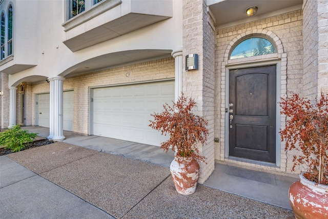 property entrance with a garage