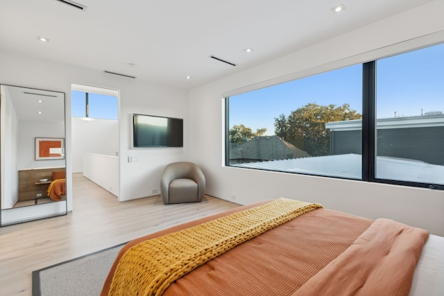 bedroom featuring light wood-type flooring