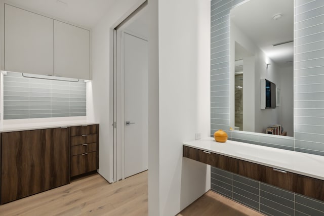 bathroom featuring vanity and wood-type flooring