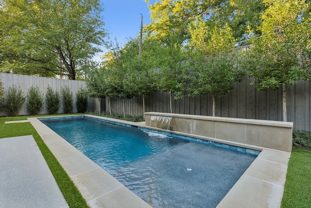 view of swimming pool featuring pool water feature