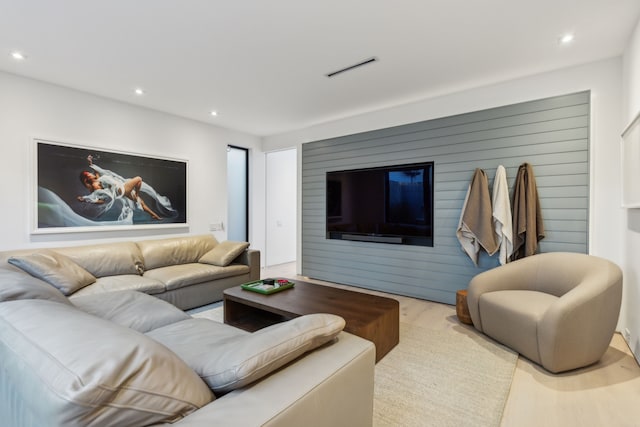 living room with light hardwood / wood-style flooring