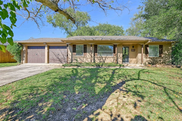 ranch-style home with a front lawn and a garage