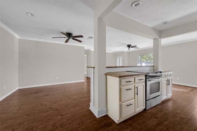 kitchen featuring dark hardwood / wood-style floors, ceiling fan, electric stove, and a textured ceiling