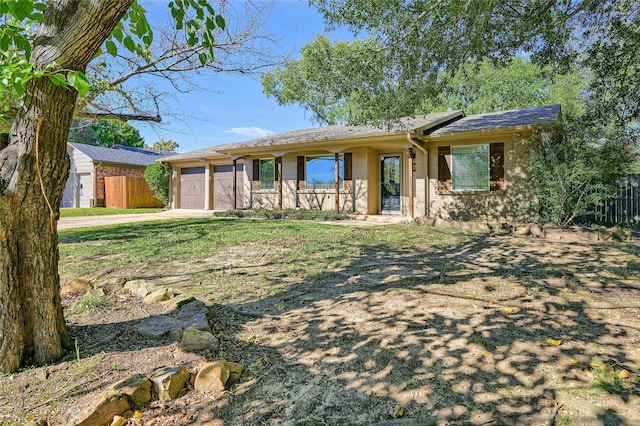 ranch-style house with a garage