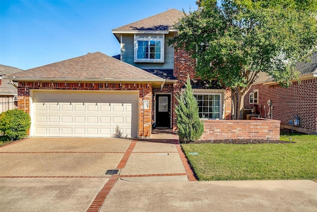 front of property featuring a garage and a front lawn