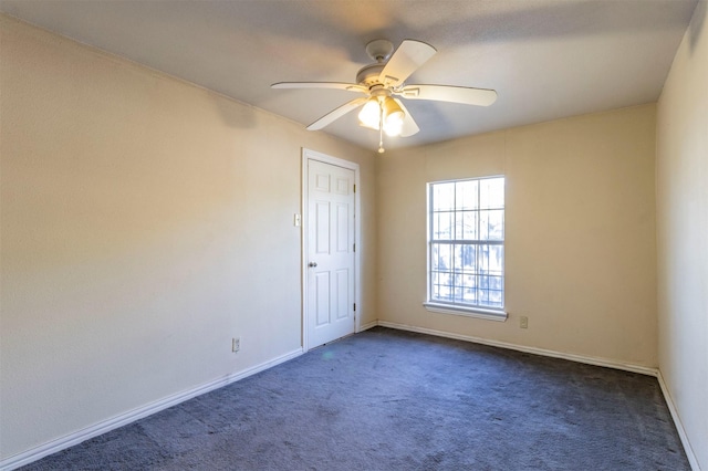 carpeted empty room with ceiling fan