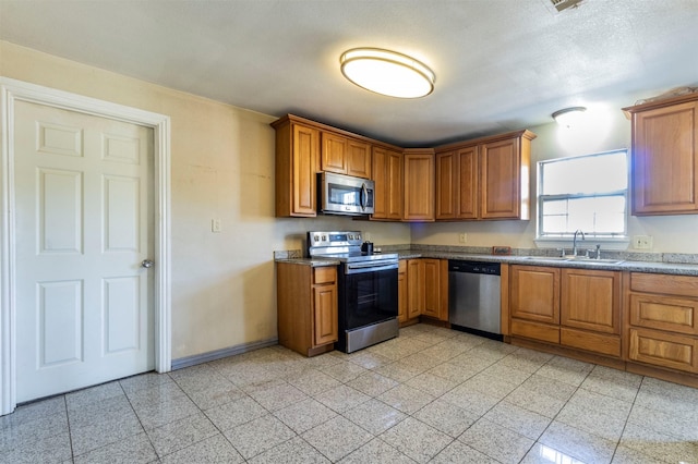 kitchen featuring sink and appliances with stainless steel finishes