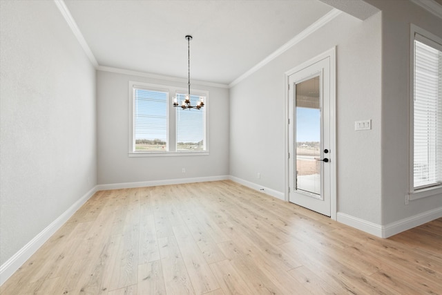 unfurnished dining area with crown molding, plenty of natural light, and light hardwood / wood-style floors