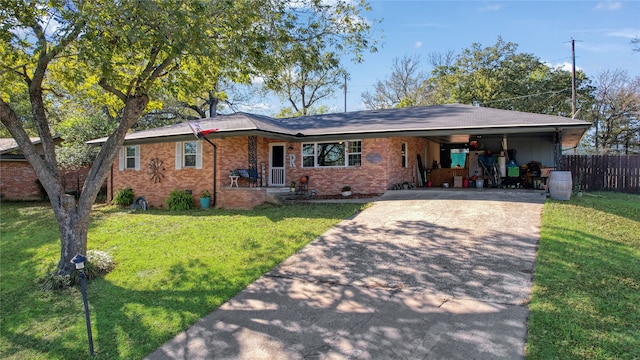 single story home with a front yard and a carport