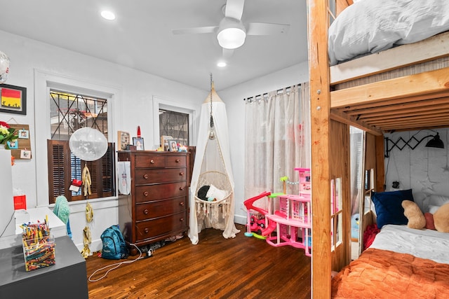 bedroom featuring hardwood / wood-style floors and ceiling fan