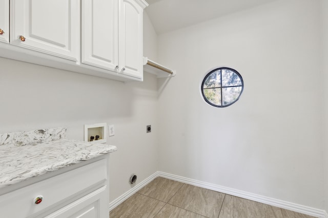 laundry area featuring hookup for a washing machine, cabinets, and hookup for an electric dryer