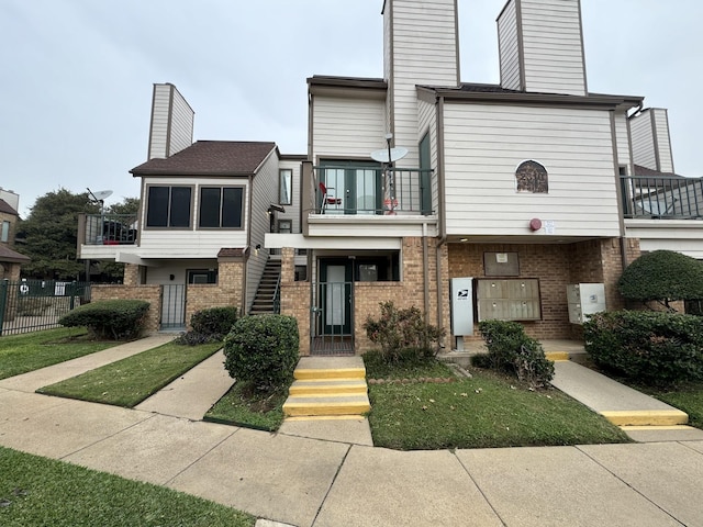 view of property with a balcony