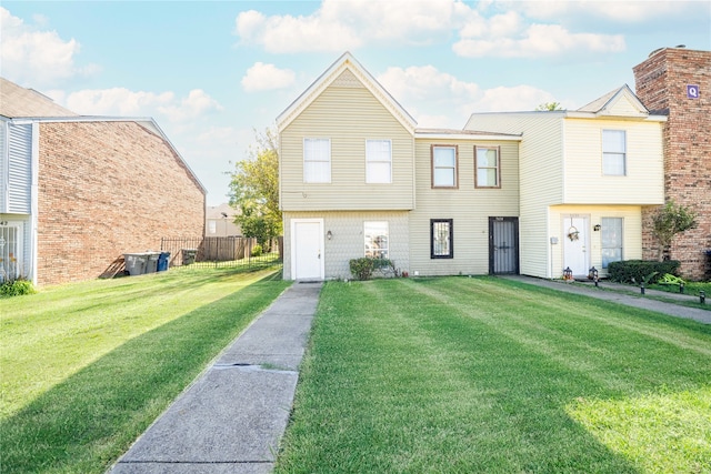 view of front of house featuring a front lawn