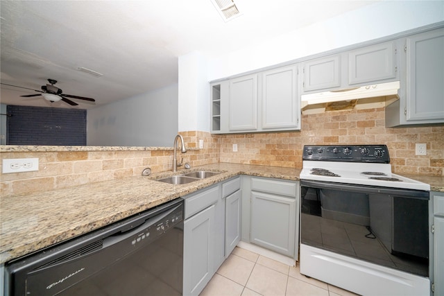 kitchen with dishwasher, decorative backsplash, sink, and electric stove