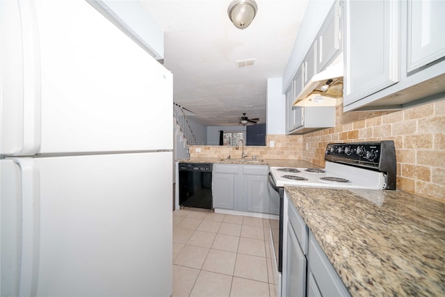 kitchen with premium range hood, white refrigerator, sink, range with electric stovetop, and black dishwasher