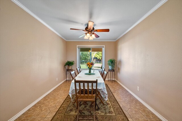 dining room with tile patterned floors, ceiling fan, and ornamental molding