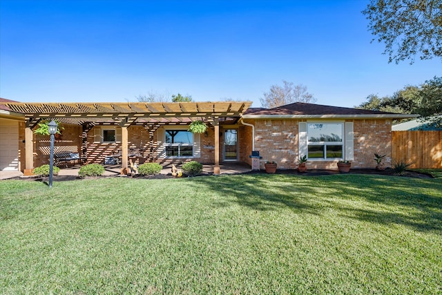 rear view of property with a pergola and a lawn