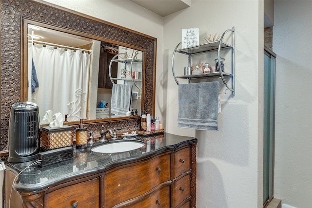 bathroom with vanity and walk in shower