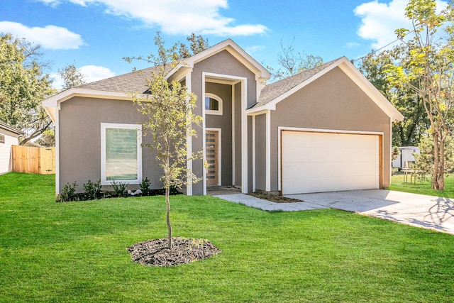 view of front facade with a garage, driveway, fence, a front lawn, and stucco siding