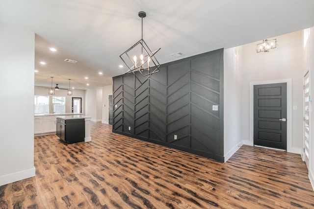 foyer with dark wood-type flooring