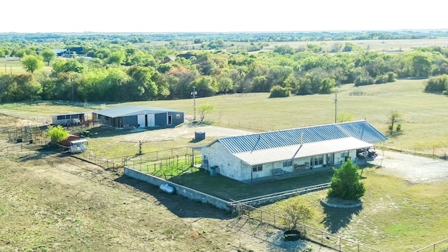 birds eye view of property featuring a rural view