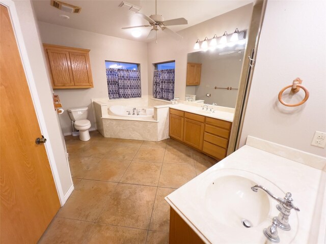 carpeted bedroom featuring ceiling fan and a closet