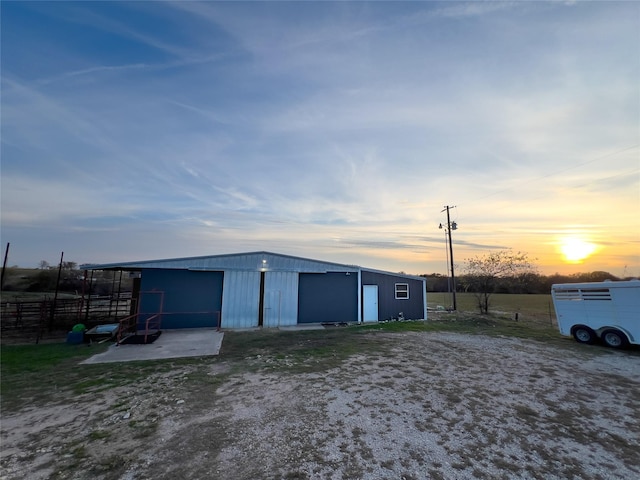 view of outdoor structure at dusk