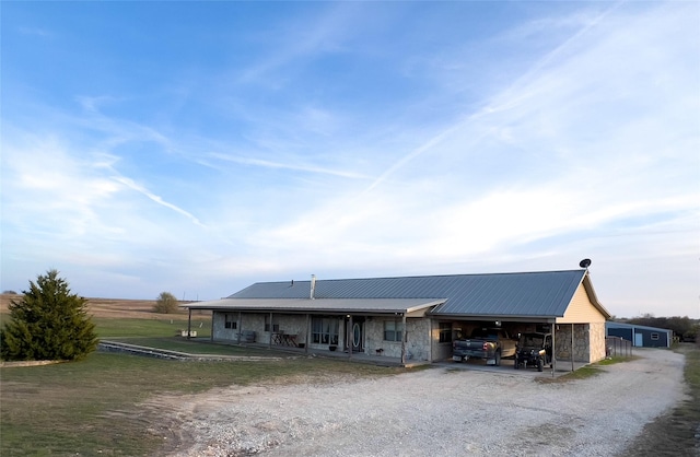 ranch-style house with a carport