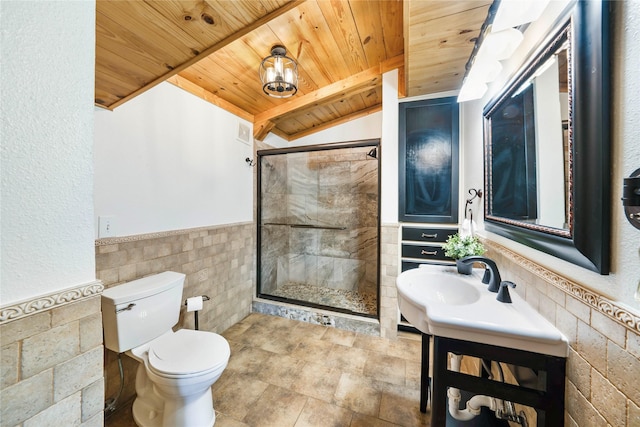 bathroom with toilet, vanity, tile walls, a shower with door, and wooden ceiling