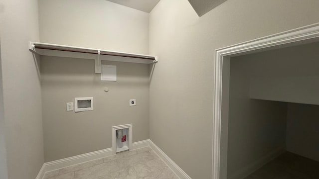 11817 Serval St, Godley, TX 76044 - washroom featuring hookup for a gas dryer, electric dryer hookup, washer hookup, and baseboards
