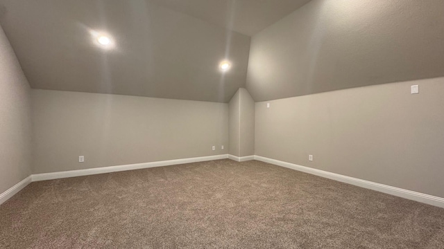 11817 Serval St, Godley, TX 76044 - additional living space with lofted ceiling, carpet, and baseboards