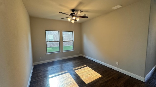 11817 Serval St, Godley, TX 76044 - empty room with baseboards, ceiling fan, and dark wood finished floors