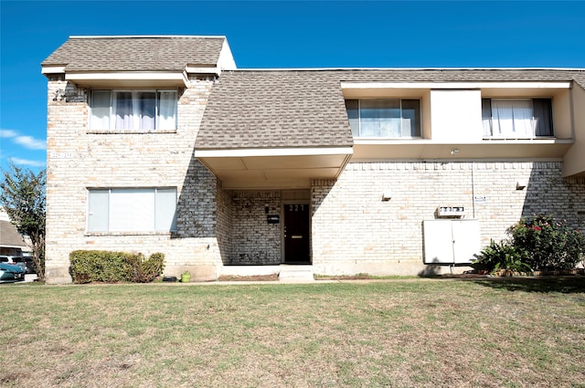 exterior space featuring a front lawn