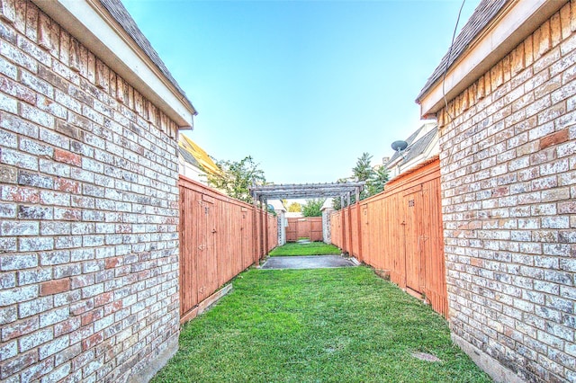 view of yard with a pergola